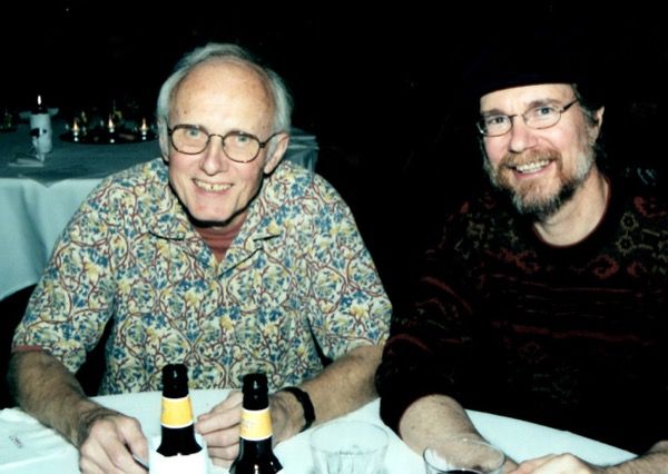 Jim Thatcher and Jim Allen sitting at a desk